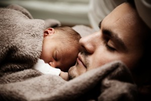 sleeping dad and baby